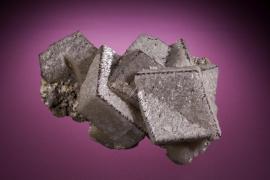 Calcite, Naica, Chihuahua, Mexico. Calcite, Naica, Chihuahua, Mexico. Twinned calcite crystals with edges accented by tiny pyrite crystals. Donor: P. & J. Clifford. Specimen 11.5 cm long. Photo by M. Schorr. (PJC 11132)