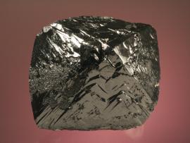 Cassiterite, Mount Xuebaoding, Sichuan, China. Cassiterite, Mount Xuebaoding, Sichuan, China. A very large and lustrous cassiterite crystal from a modern classic locality. Donor: S. and C. Smale. Specimen 11.5 cm wide. Photo by G. Robinson. (DM 27709)