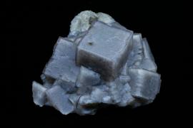 Fluorite, White Rock Quarry, Clay Center, Ohio. Fluorite, White Rock Quarry, Clay Center, Ohio. A SW-UV photo showing the strong fluorescence of Ohio fluorites. Donor: D. Gabriel. Specimen 17 cm wide. Photo by G. Robinson. (DM 24530)