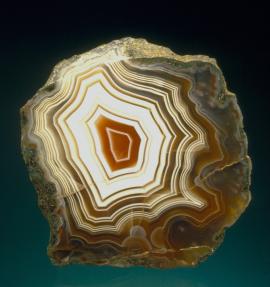 Agate, Lake Superior, Michigan. Agate, Lake Superior, Michigan. A brightly banded Lake Superior agate. From the collection of J. T. Reeder. Specimen 6 cm tall. Photo by J. Scovil. (JTR 997)