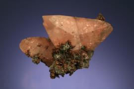 Calcite with native copper inclusions, Quincy Mine, Houghton County, Michigan. Probably the finest twinned copper included calcite specimen in the collection. From the J. T. Reeder collection. Specimen 4.5 cm across. Photo by J. Jaszczak. (JTR 389)