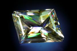 Calcite (faceted), St. Joe Lead Mine, Balmat, New York. Calcite, St. Joe Lead Mine, Balmat, New York. Calcite is too soft to be used in jewelry, but cut calcite can rival diamonds. This large stone was cut by master gem cutter Arthur Grant. Donor: H. Dibble. 6.5 cm, 1071 carats.G. Robinson photo.6.5 cm, 1071 carats.