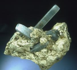 Celestine, Holloway Quarry, Monroe County, Michigan.  Celestine, Holloway Quarry, Monroe County, Michigan. Gray-blue celestine crystals showing a tabular habit that is unique to Holloway. Specimen 14 cm wide. Photo by G. Robinson. (DM 24185)