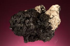 Manganite, Lucy Mine, Negaunee, Michigan.  Manganite, Lucy Mine, Negaunee, Michigan. A superb crystal group of manganite crystals from Michigan. Donor: D. C. Gabriel. Specimen 13.5 cm wide. Photo by C. Stefano. (DCG 400)