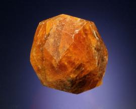 Spessartine, Nani, Loliondo, Tanzania.  Spessartine, Nani, Loliondo, Tanzania. Spessartine is a member of the garnet group and is perhaps one of the more beautiful garnet species. These large spessartines from Tanzania are among the best. Donor: The Arkenstone. Specimen 5 cm across. Photo by G. Robinson. (DM 30129)