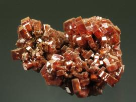 Vanadinite, ACF Mine, Mibladen, Morocco. Vanadinite, ACF Mine, Mibladen, Morocco. Sharp orange vanadinite crystals from the world’s premier locality for the species. Specimen 6 cm wide. Photo by G. Robinson. (DM 19804)